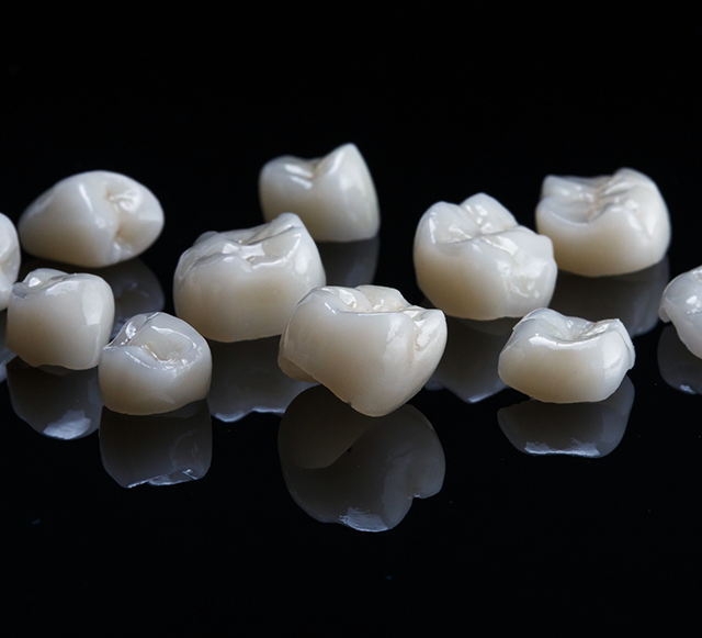 Multiple metal-free crowns on black surface