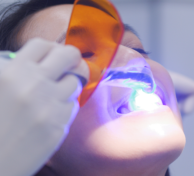 Dental patient receiving direct bonding