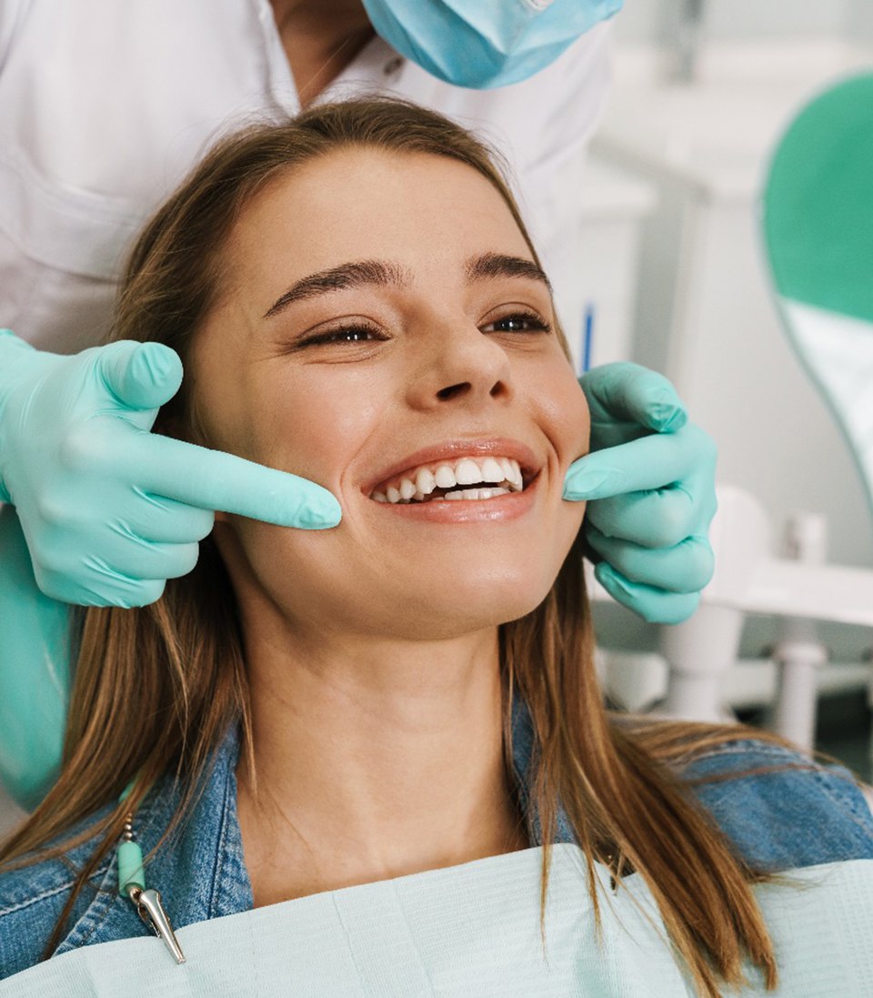 Woman smiling at the dentist